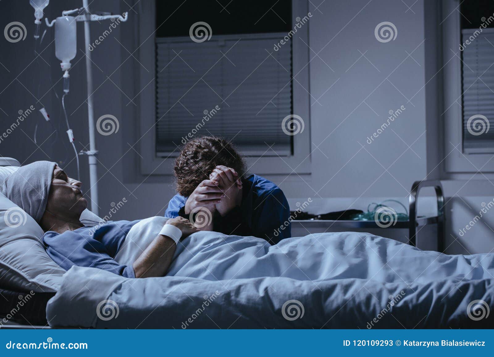 Daughter Crying At Bed With Dying Mother With Cancer In The Hospital daughter-crying-at-bed-with-dying-mother-with-cancer-in-the-hospital
