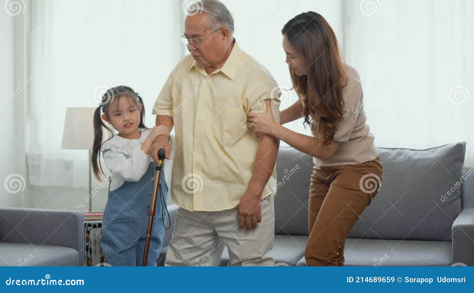 Daughter and Granddaughter Take Care Support Grandfather Who is Suffering from Knee Pain Got Walking Stock Video photo picture