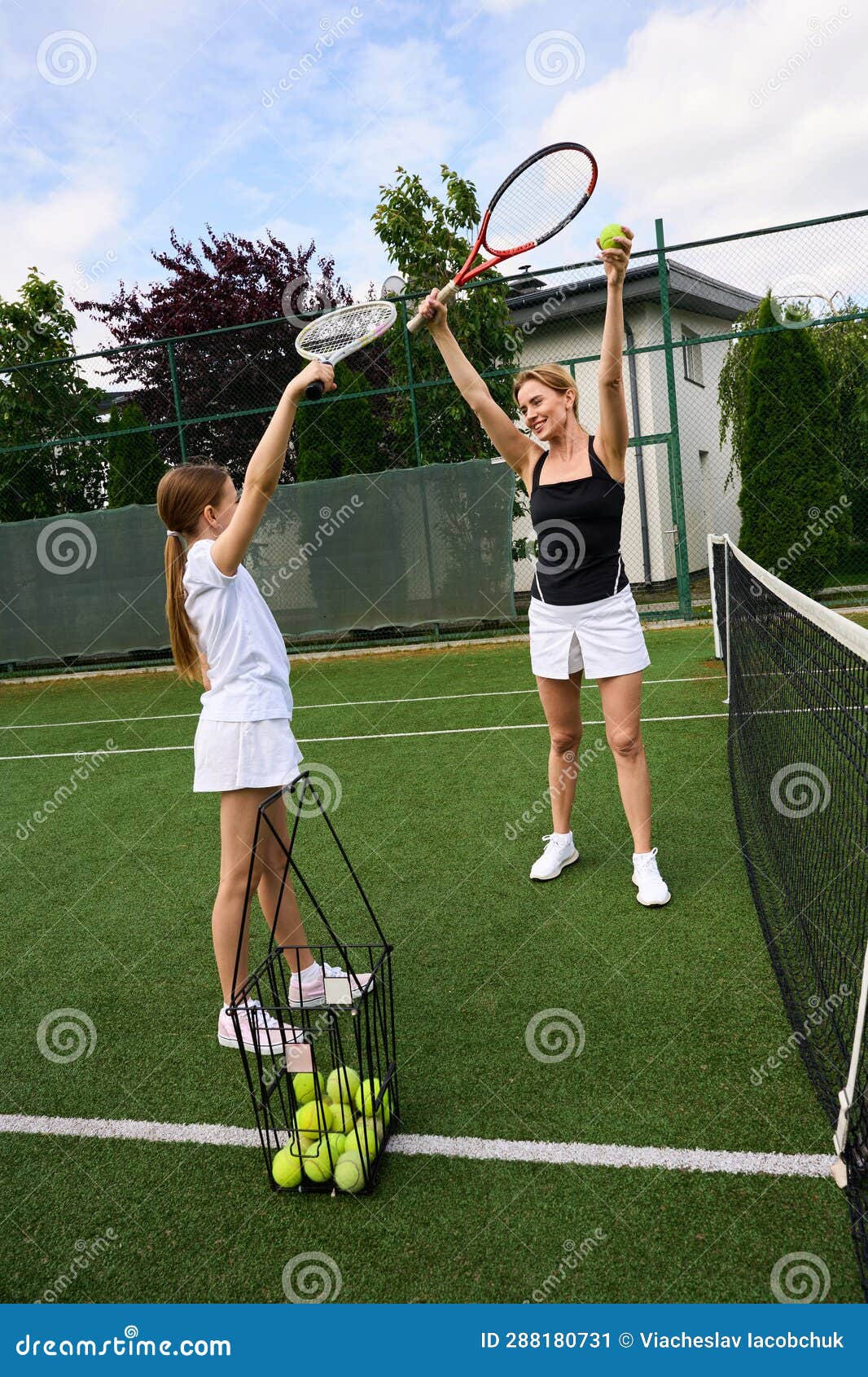 Daughter and Mother are Training on the Tennis Court Stock Image ...