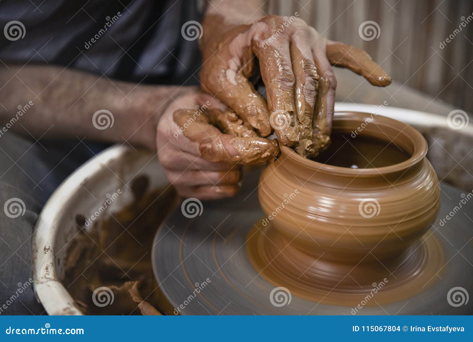 A Day in the Life of a Pottery Artist at the Pottery Wheel. Stock