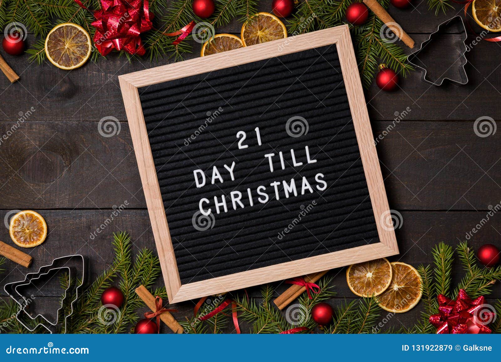 21 Day Till Christmas Countdown Letter Board on Dark Rustic Wood Stock