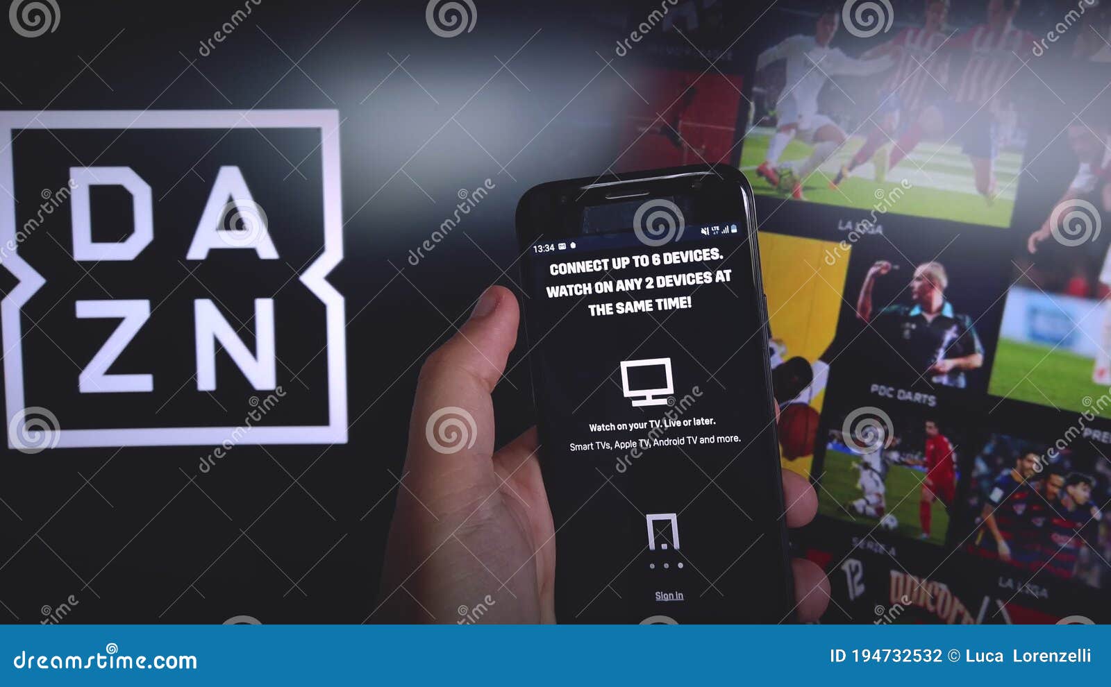 DAZN App for Mobile Phone with DAZN Background - DAZN is a Subscription Sports Streaming Service with on Demand and Live Stock Footage