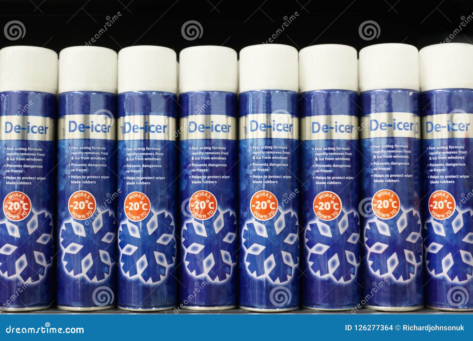 Liquid Spray for Car Window Defrost in Winter Season. Stock Photo