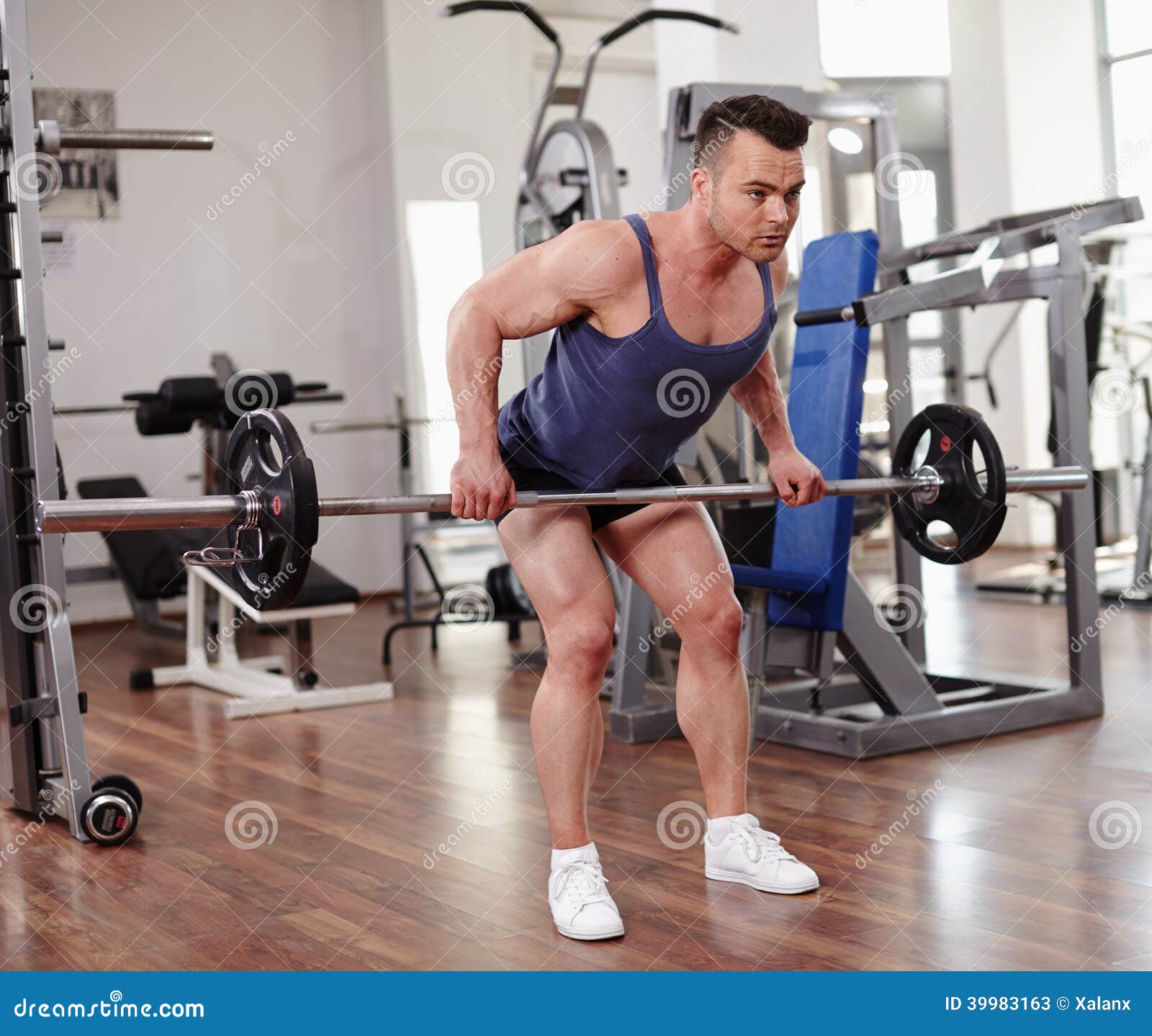 Deadlifts with a barbell stock image. Image of fitness 39983163