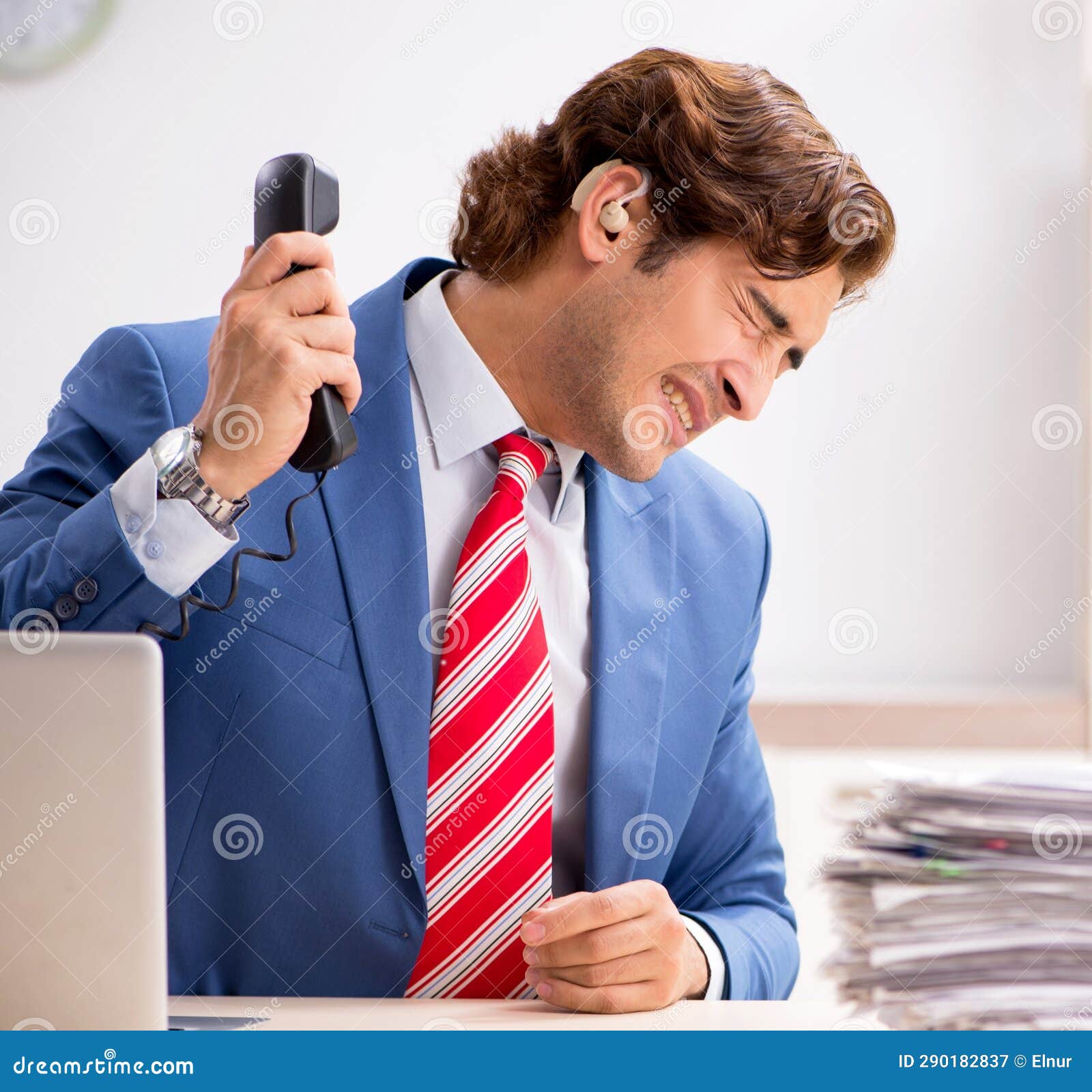 Deaf Employee Using Hearing Aid in Office Stock Image Image of