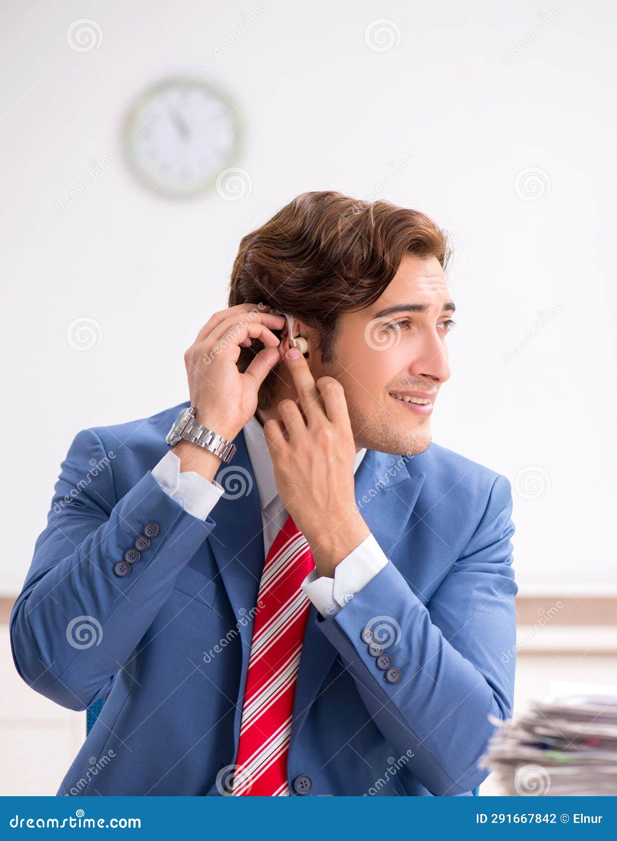 Deaf Employee Using Hearing Aid in Office Stock Photo Image of