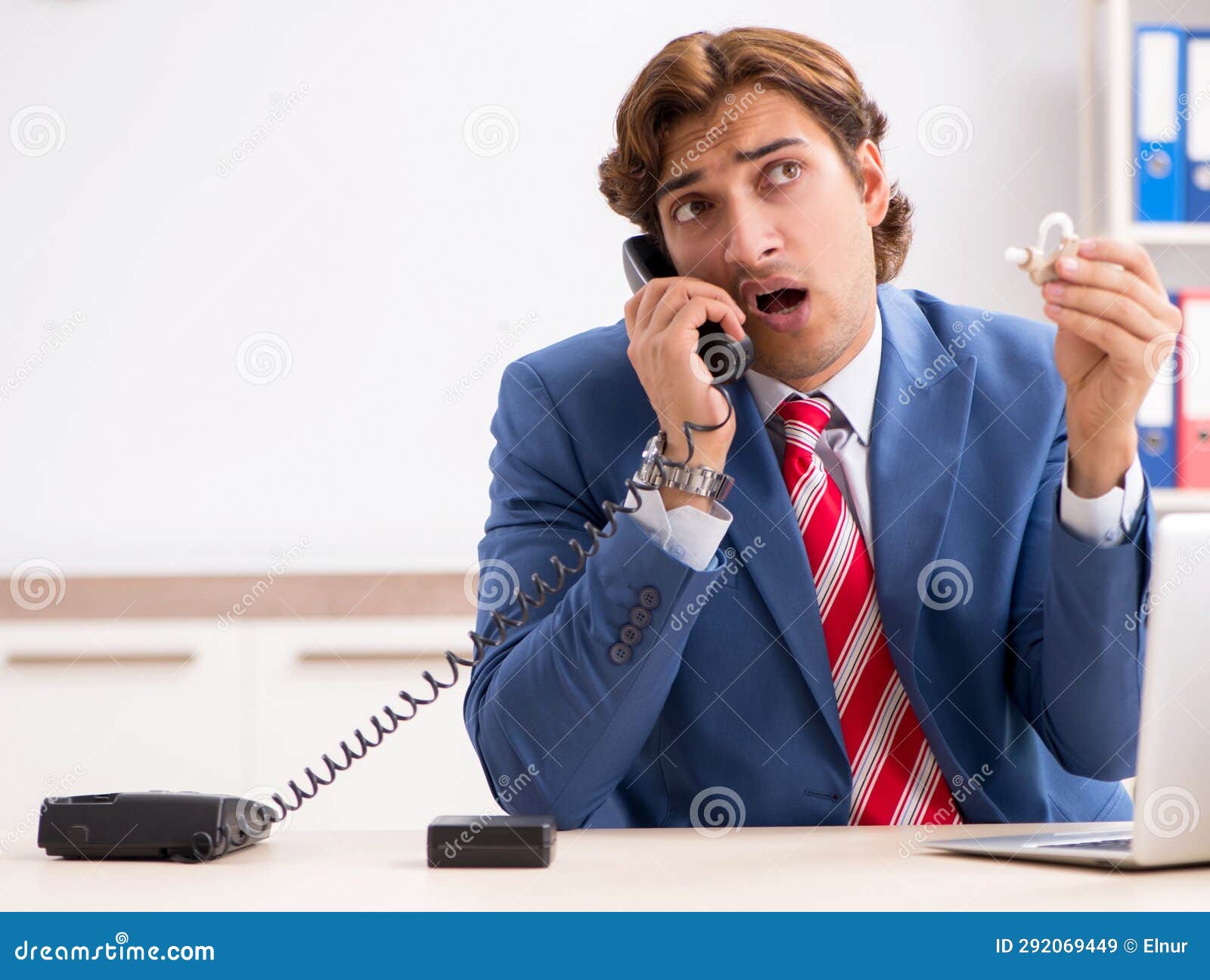 Deaf Employee Using Hearing Aid in Office Stock Image Image of
