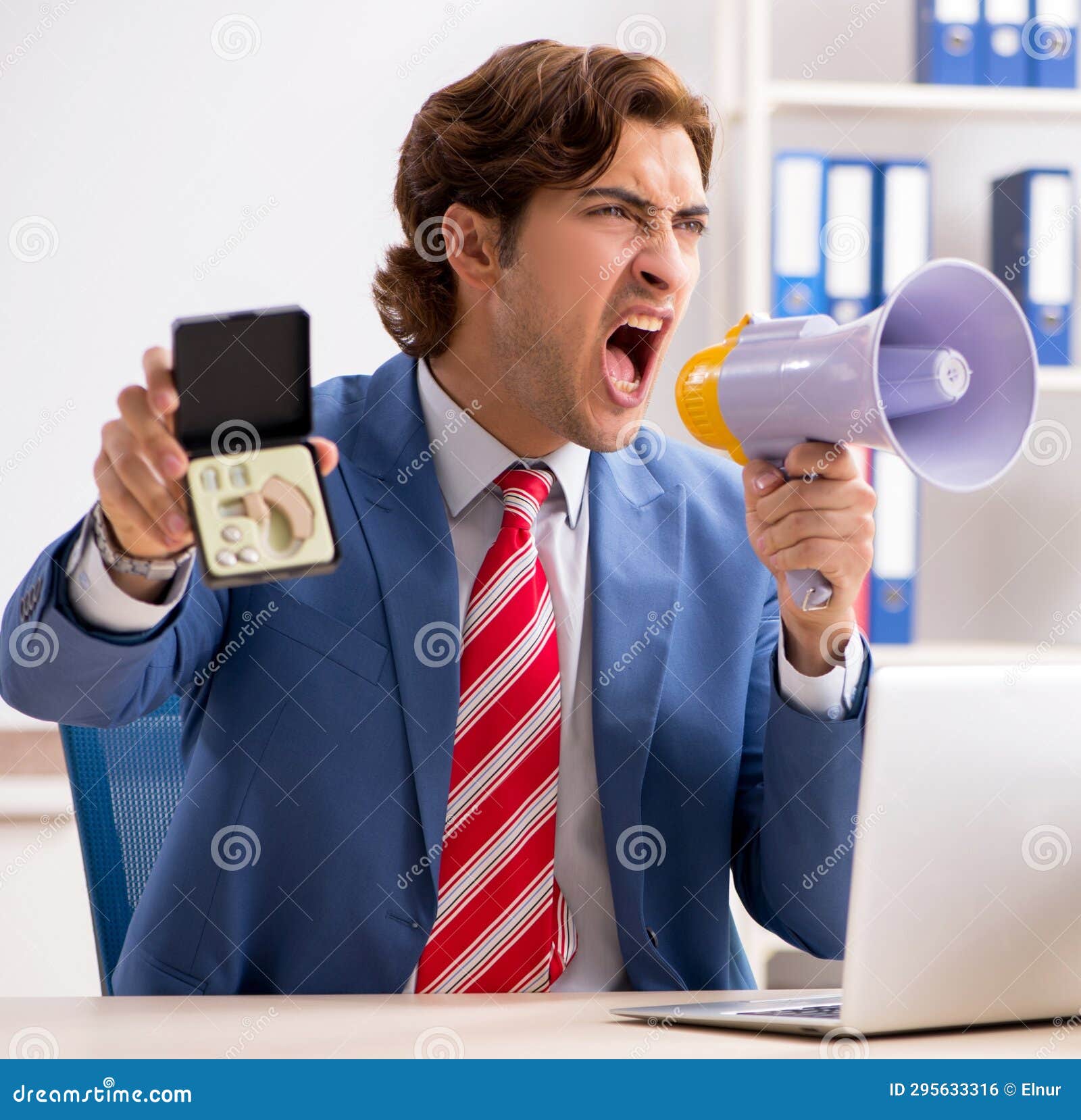 Deaf Employee Using Hearing Aid in Office Stock Photo Image of