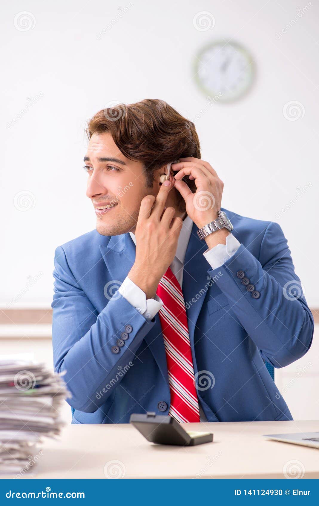 The Deaf Employee Using Hearing Aid in Office Stock Photo Image of