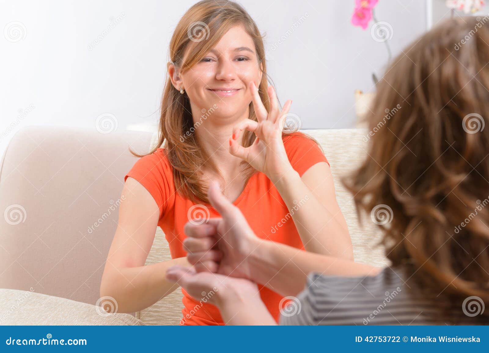 deaf woman learning sign language