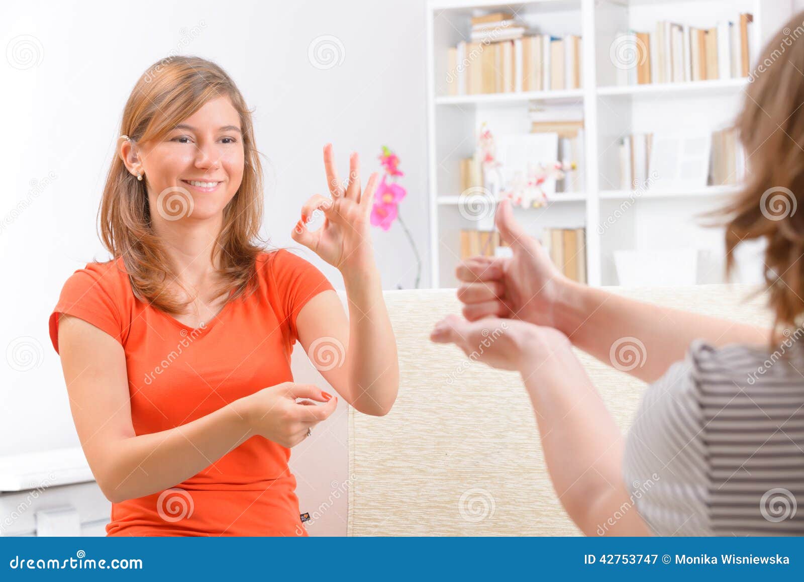 deaf woman learning sign language