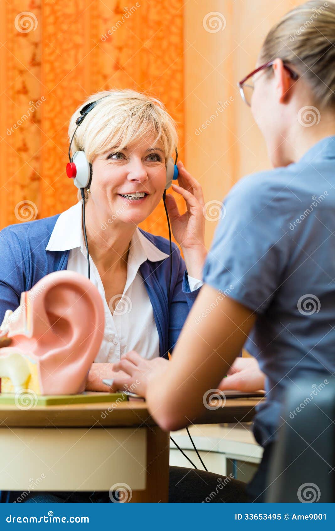 deaf woman takes a hearing test