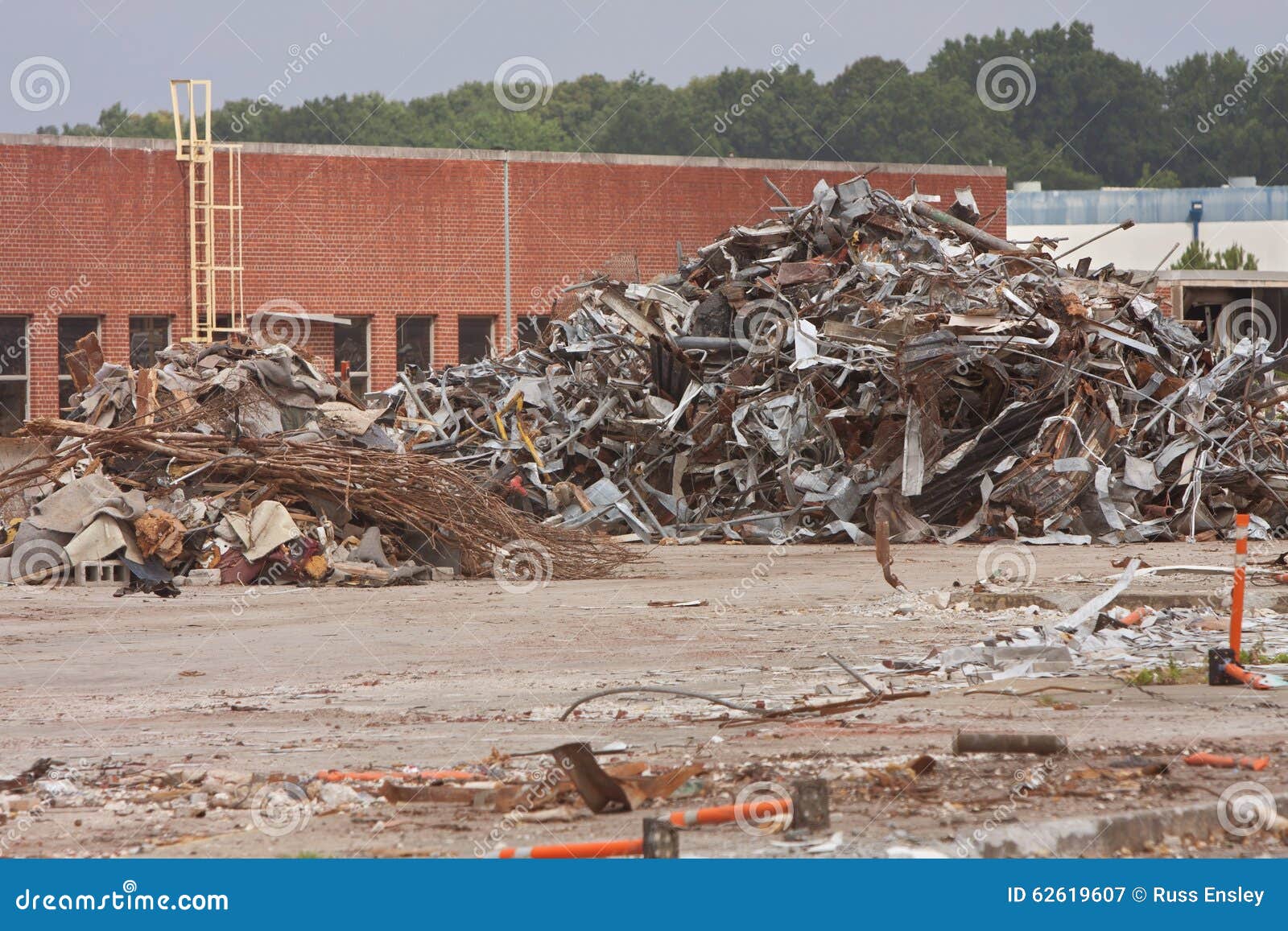 Debris is Stacked High at Auto Assembly Plant Demolition Site Stock