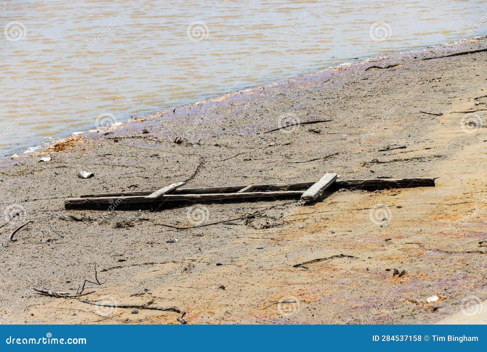 Debris on Stuck in the Dry Lake Bed Found after Draining Stock Photo