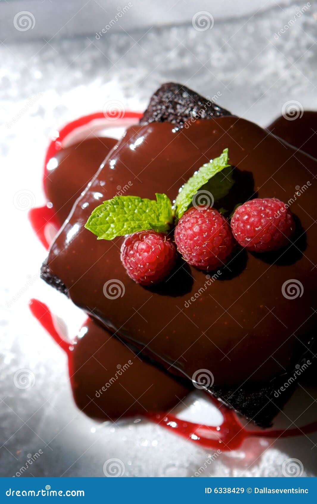 decadent chocolate cake with raspberries