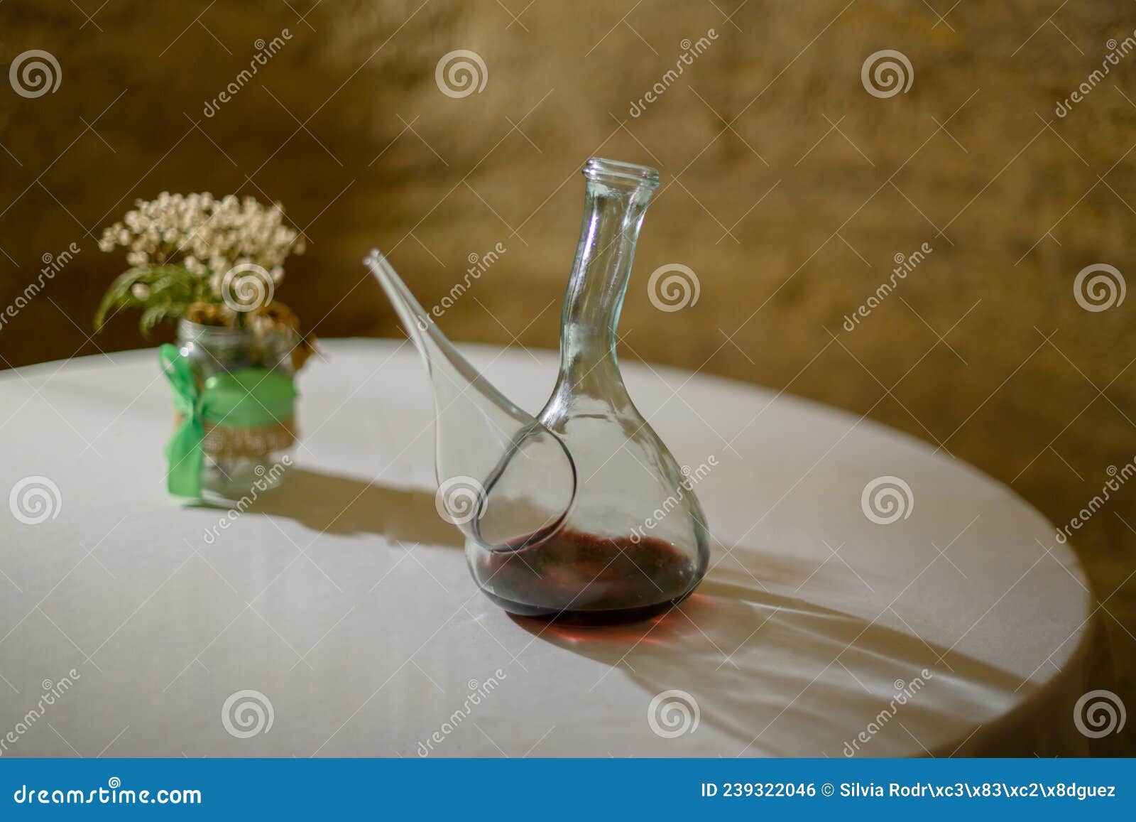 Decanter with Red Wine on a Table . Wine Drinking Vessel Typical of