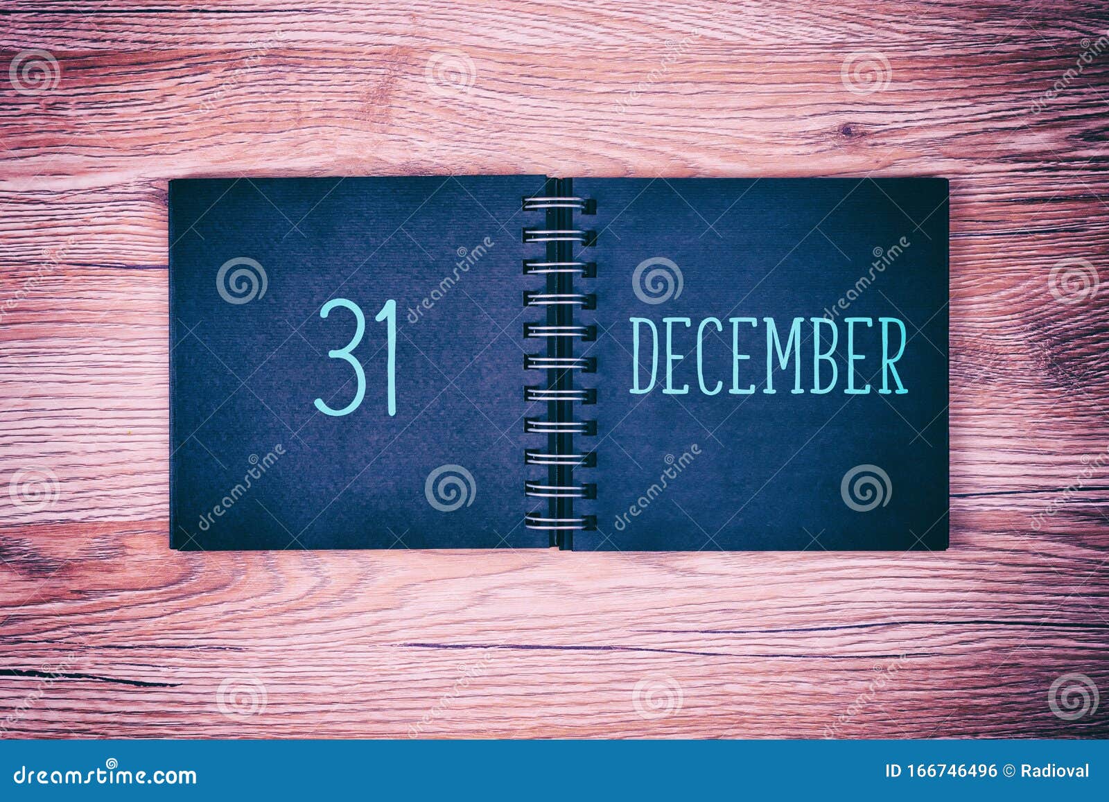 31 December Desk Calendar On Wooden Background New Year