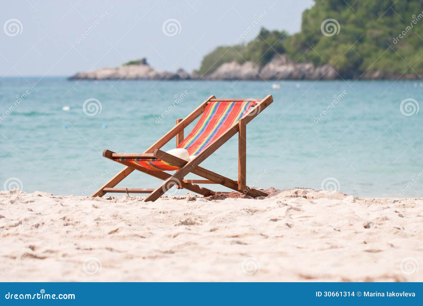 Deck chair on beach stock photo. Image of scene, tourist - 30661314
