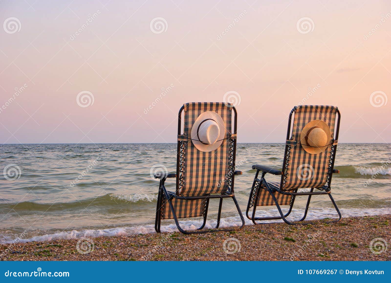 Deck chairs on a beach. stock image. Image of chair 107669267