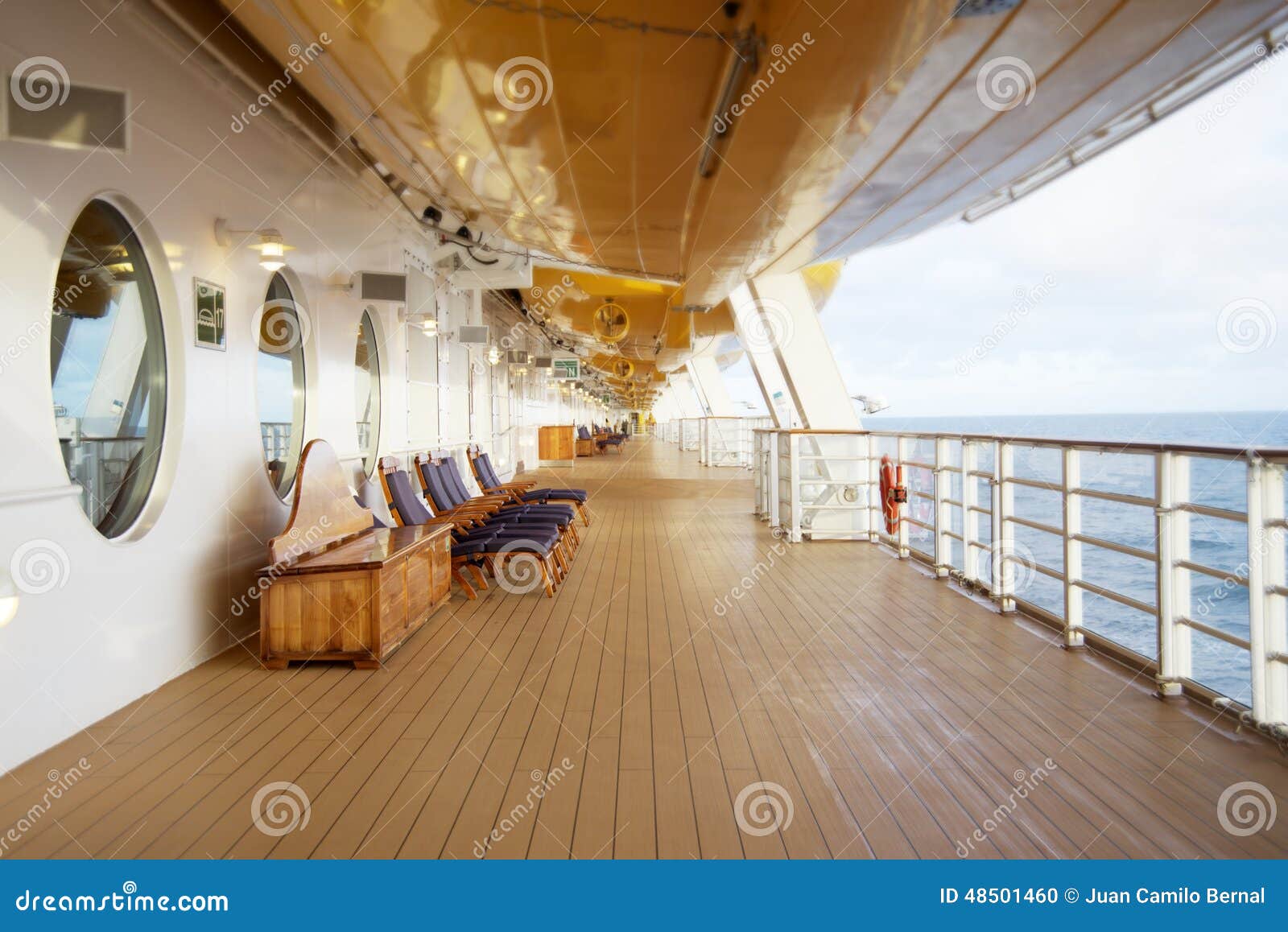 deck-chairs-cruise-ship-circular-windows-back-48501460