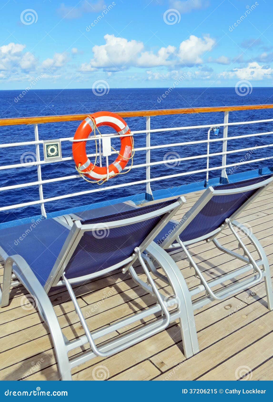 Deck lounge chairs stock image. Image of rail, travel 37206215
