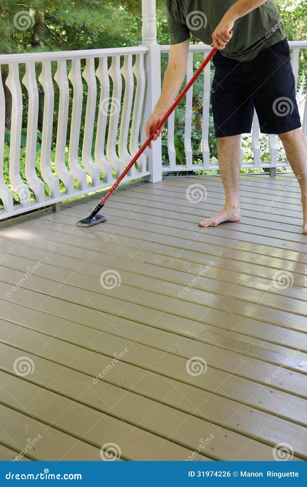 Deck Staining stock photo. Image of second, painter, wooden 31974226