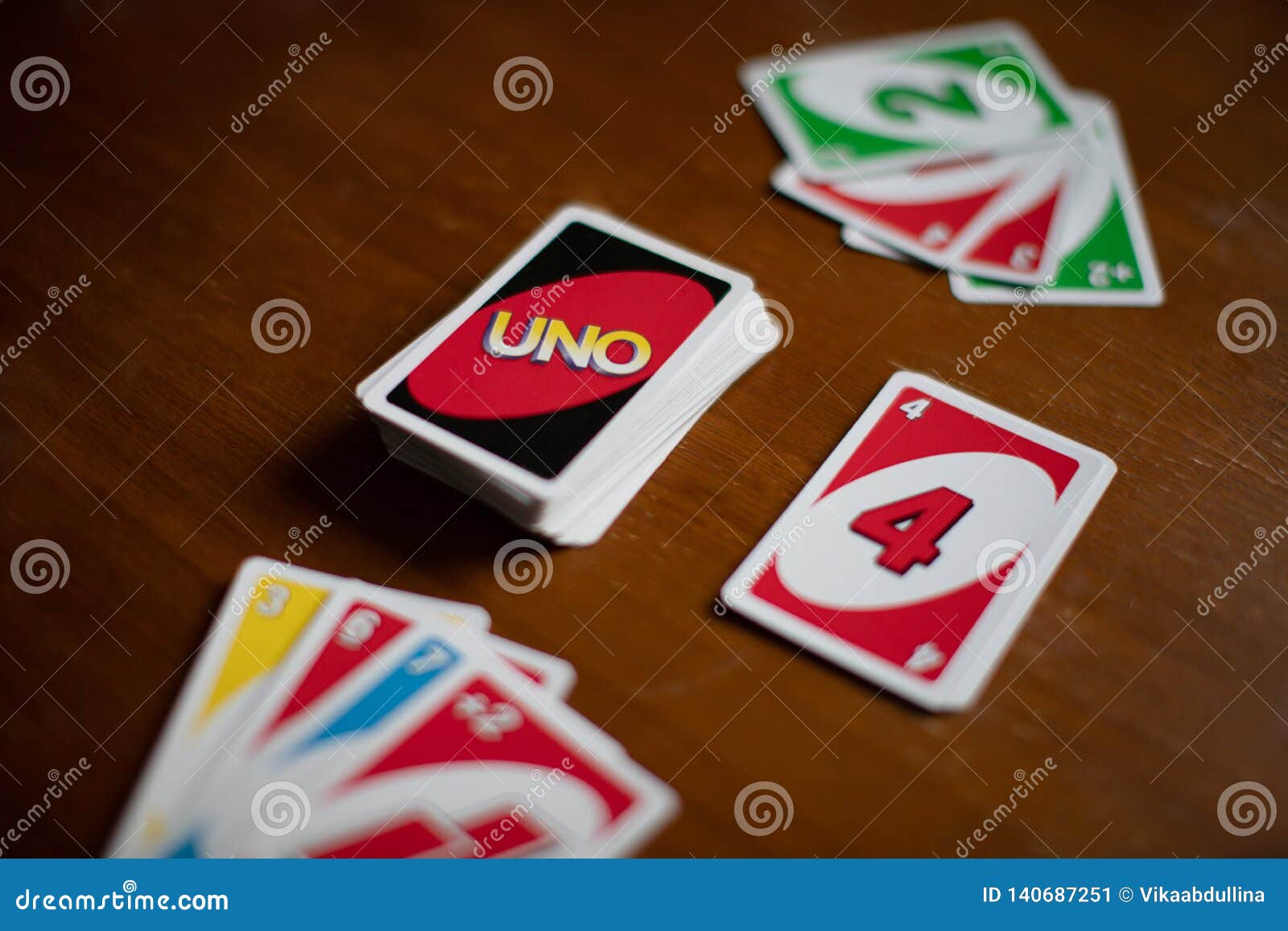 Deck Of Uno Game Cards Scattered All Over On A Table. American Card Game. Editorial Photo ...