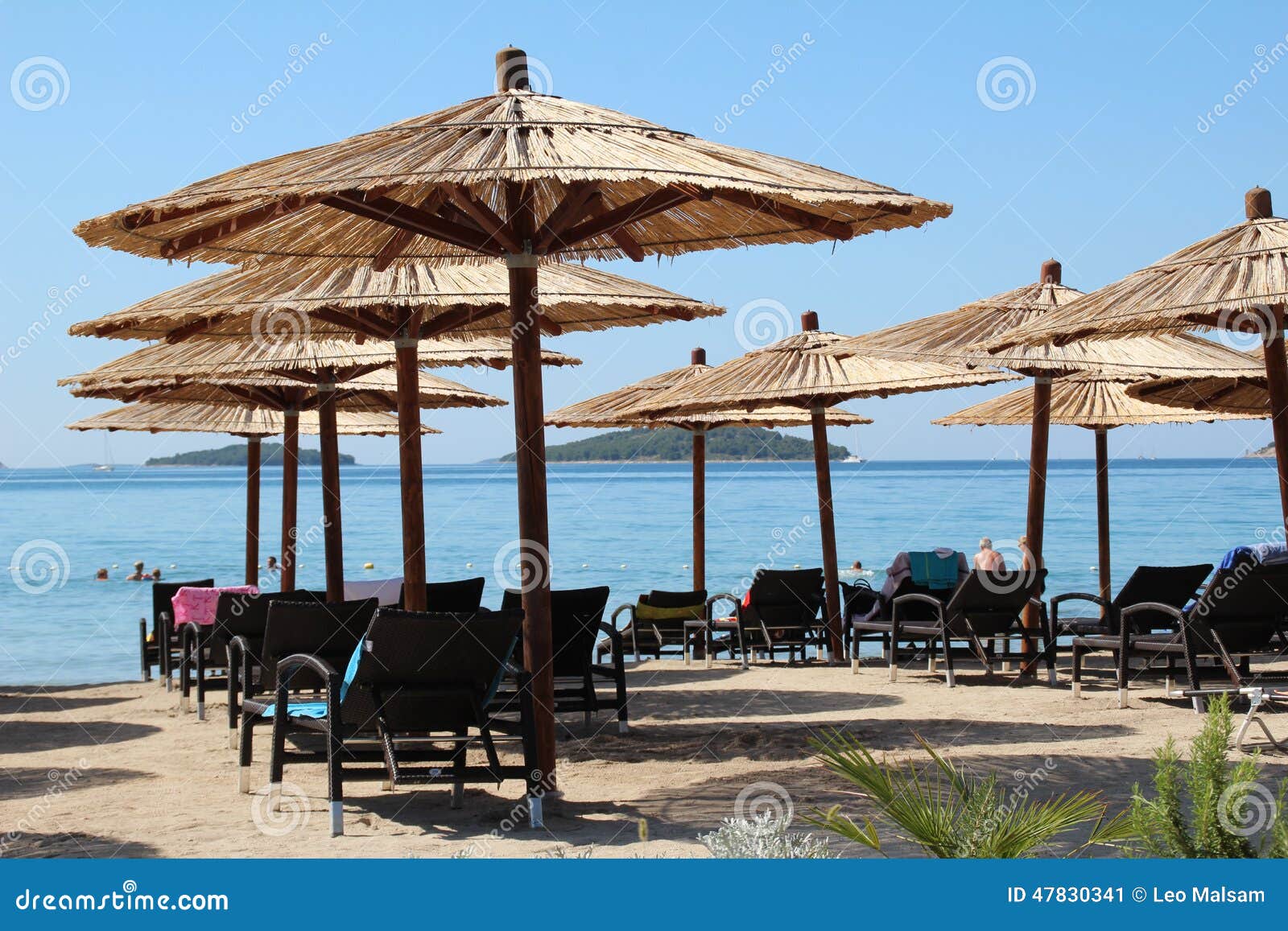 Deckchairs and Beach Umbrellas on a Croatian Beach Stock Image - Image ...