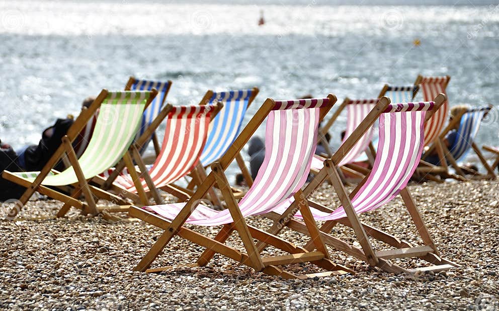 Deckchairs on Brighton Beach Stock Photo Image of fabric, coastline 20630498