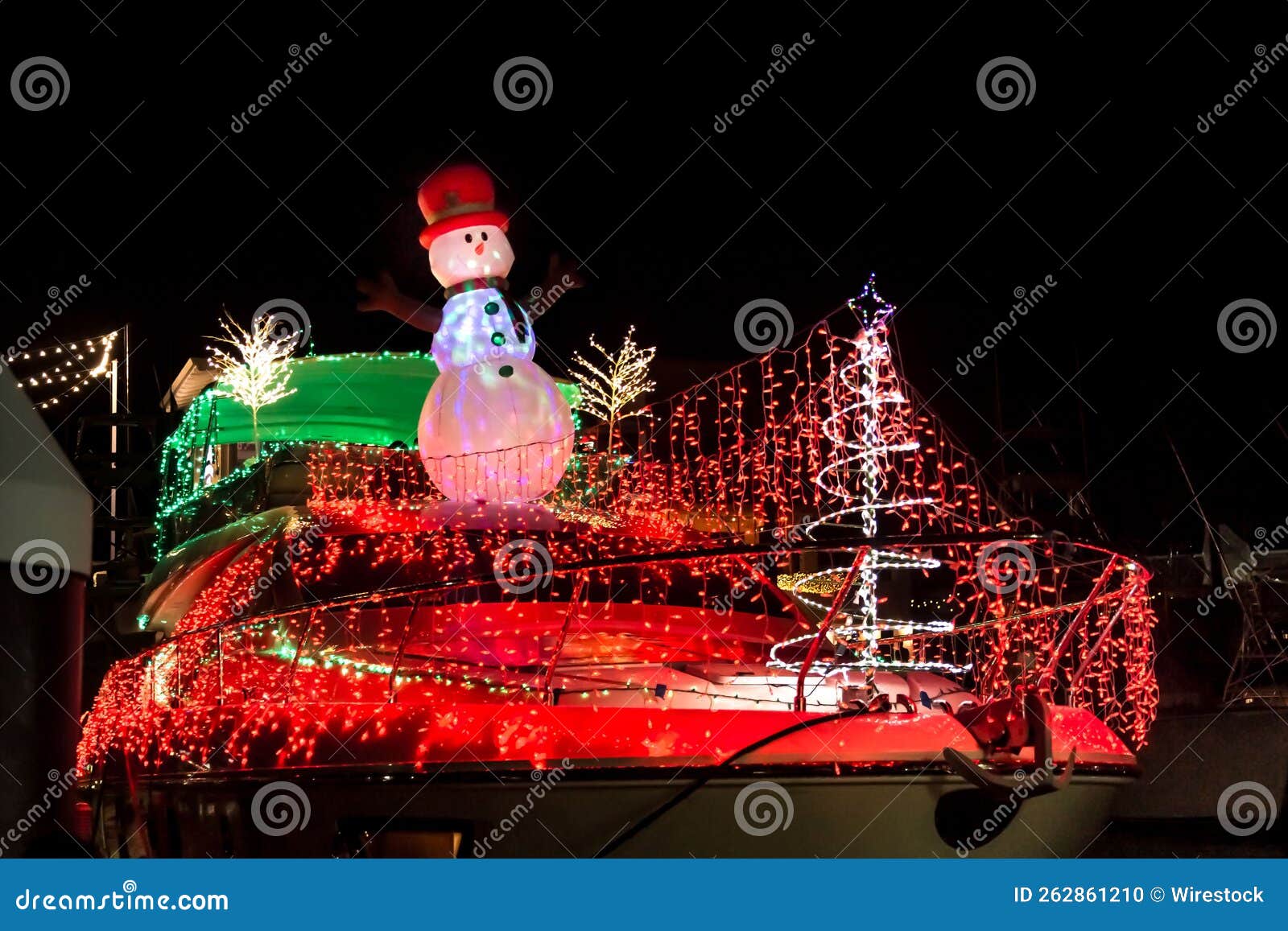 decorated christmas boat in marina pez vela in quepos, costa rica