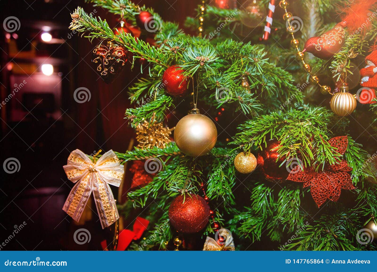 Decorated Christmas Tree in Golden Light Stock Photo - Image of glass ...