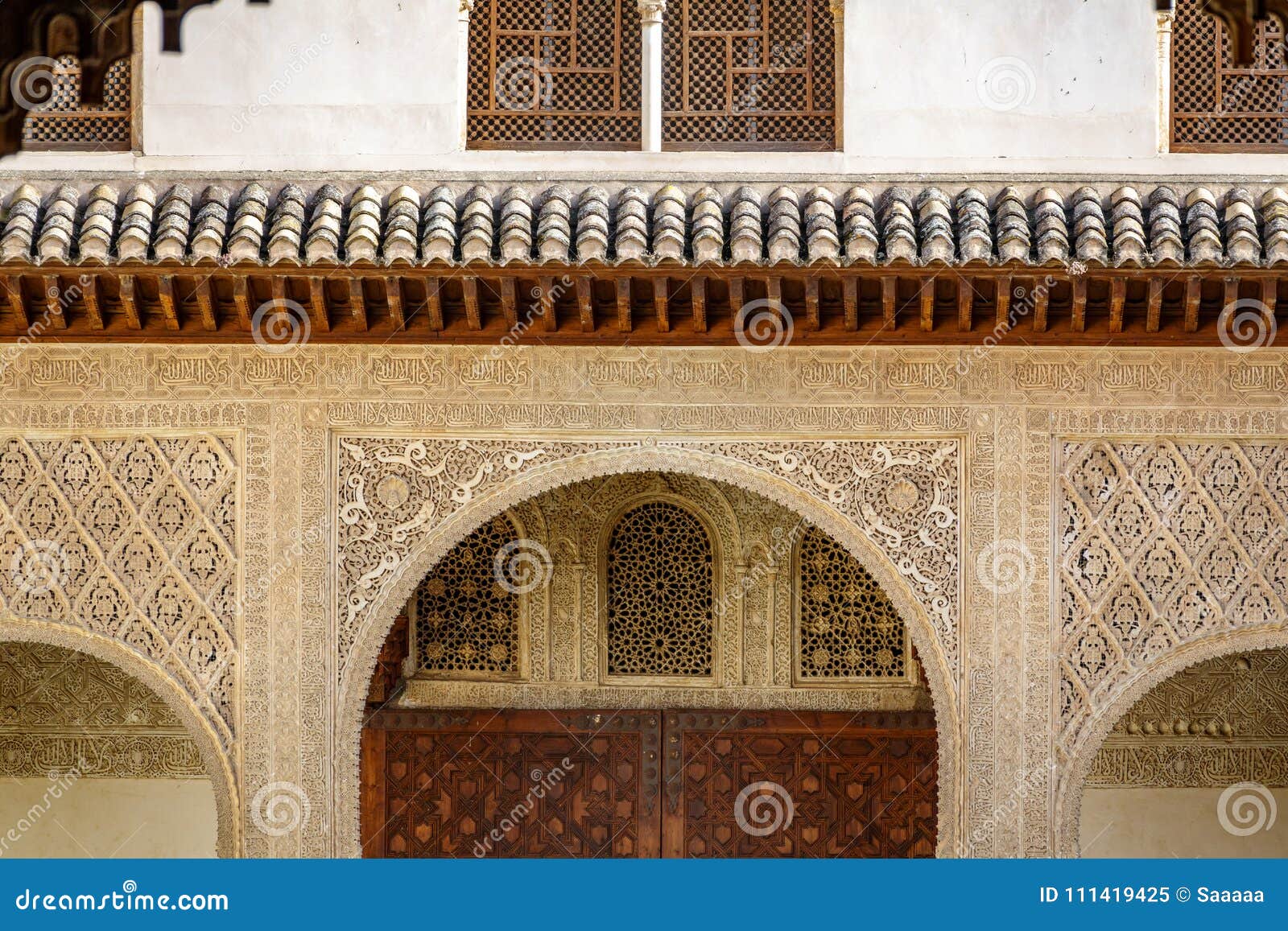 decorated tiles and columns with geometric s and colors in the alhambra, spain