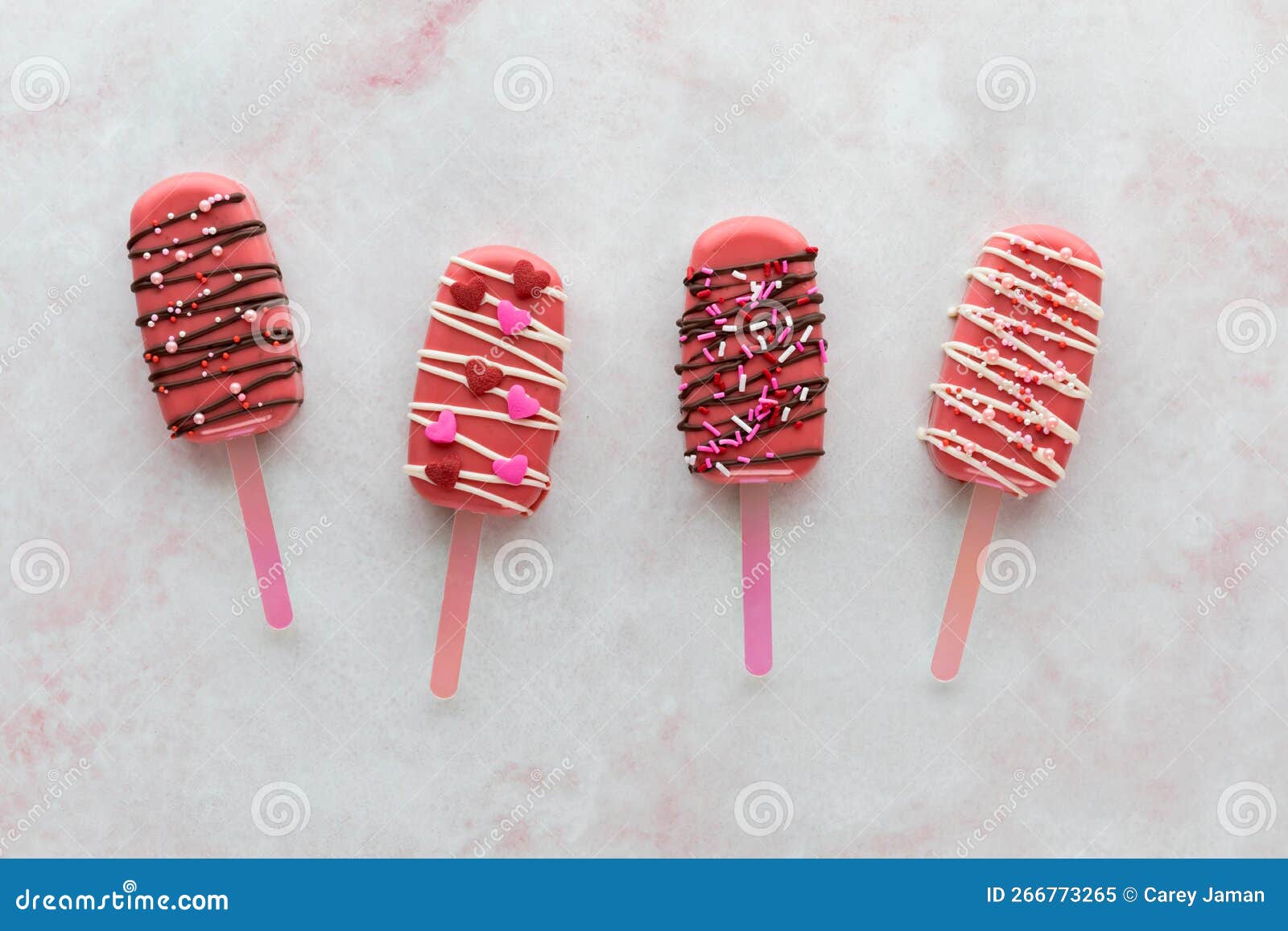 Decorated Valentine Cakesicles with Candy Melt Drizzle and Sprinkles. Stock Image Image of