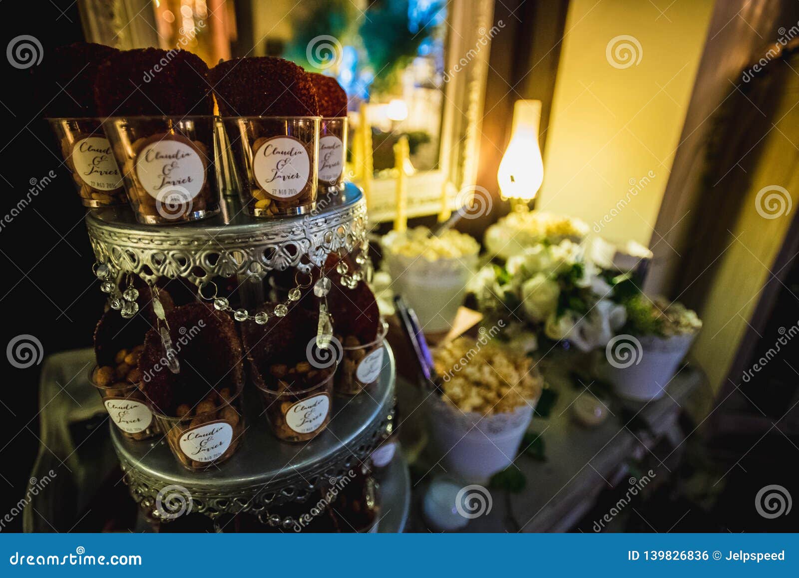 decorated wedding table with candy bar