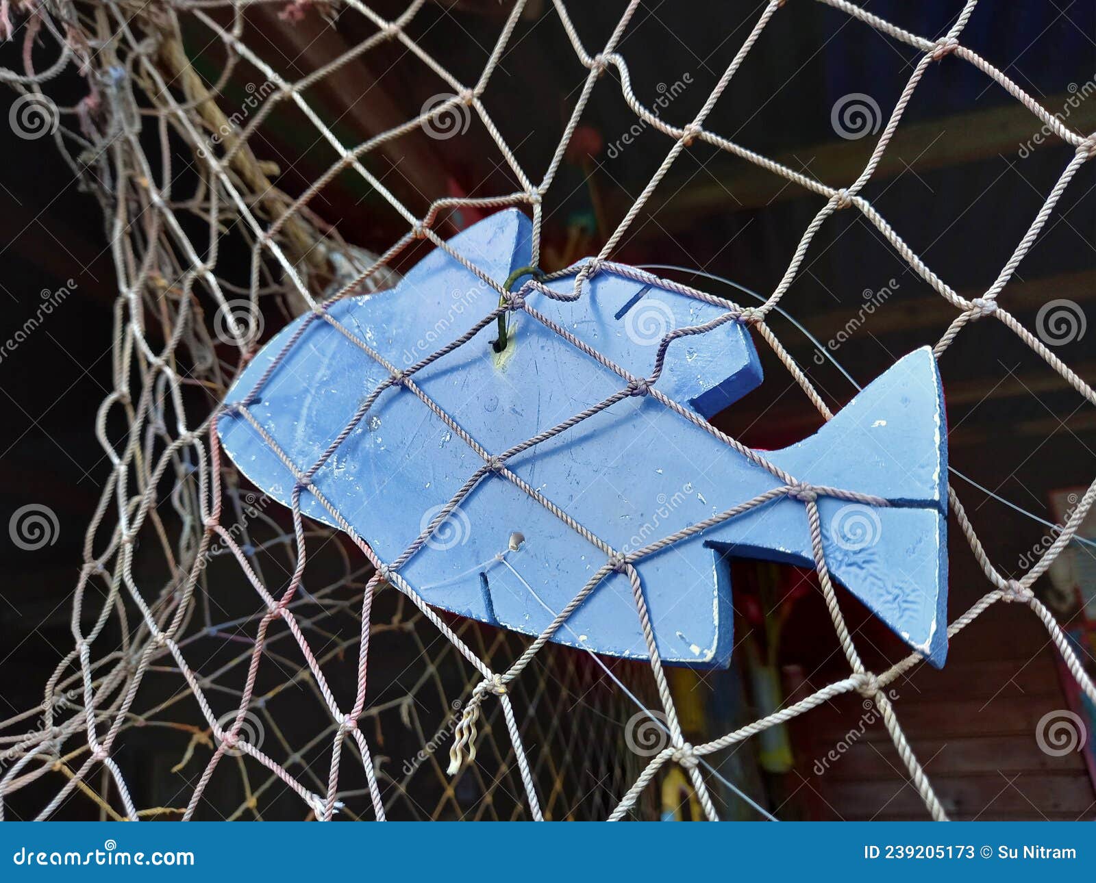 Decorative Blue Wooden Fish Hanging on Fishing Net. Sea Life Craft. Rustic  and Vintage Decoration. Fishing Net with Ornamental Stock Image - Image of  overseas, collage: 239205173