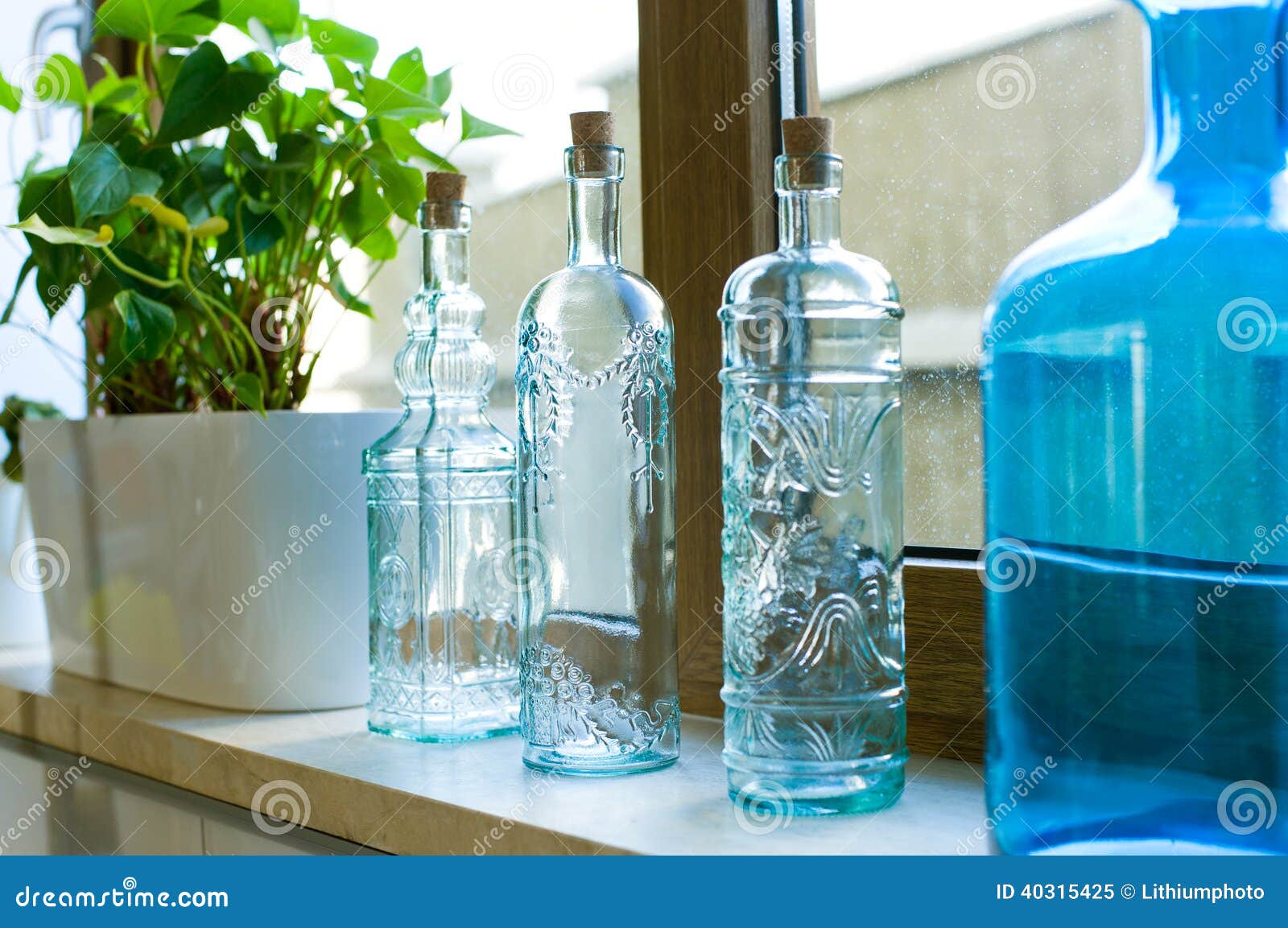 Decorative Bottles from Blue Glass on a Windowsill Stock Image Image