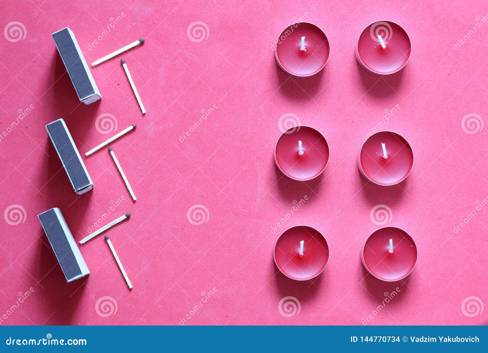 Decorative Candles, Matchboxes and Matches are Arranged in a Row. on a