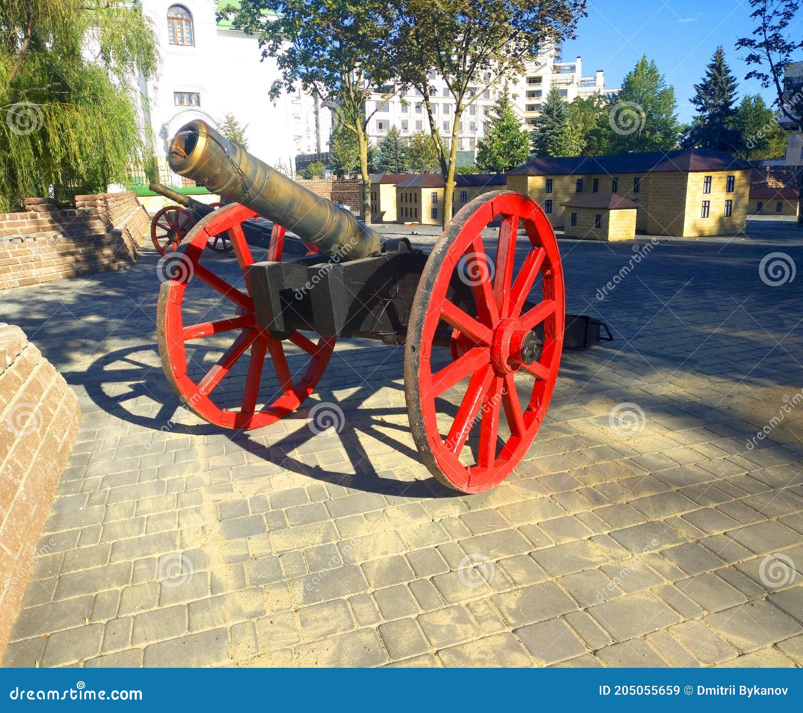 Decorative Cannon with Red Wheels Stock Image - Image of object