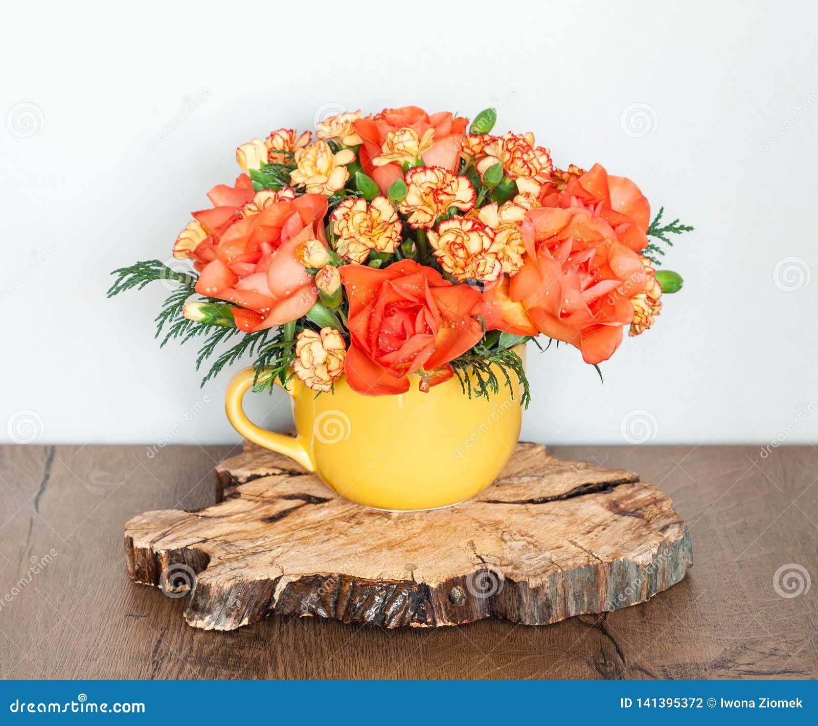 Decorative Flower Arrangement with Roses and Carnations Stock Photo