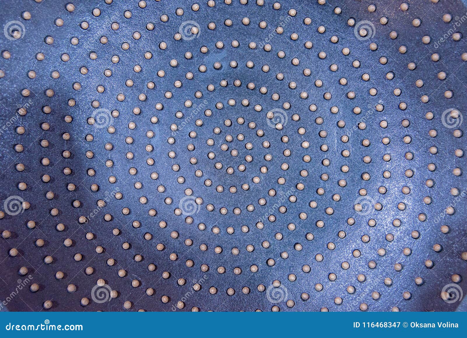 Decorative Iron Plate with Wooden Dots on it As an Abstract Back Stock