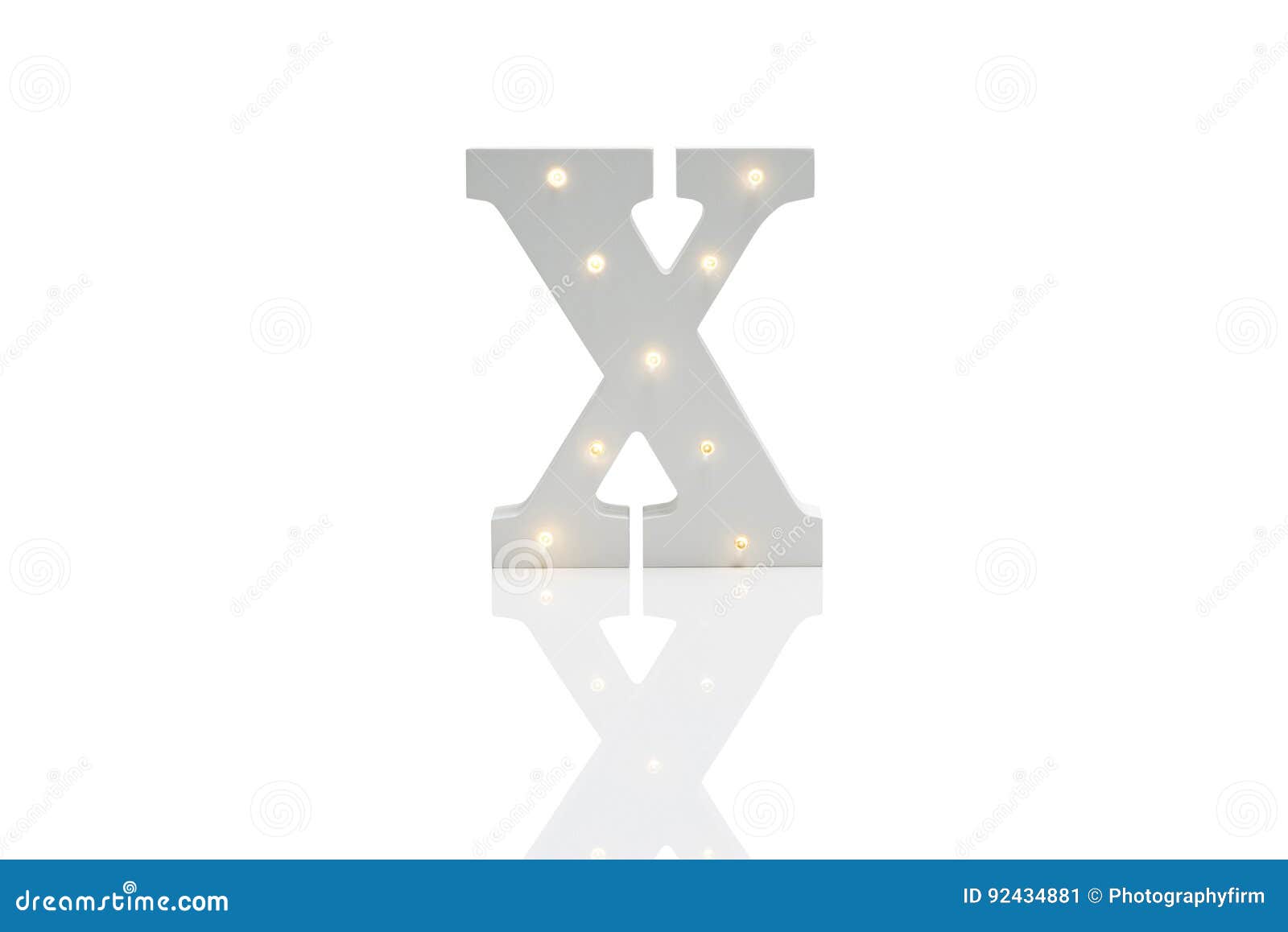 Decorative Letter X with Embedded LED Lights Over White Background