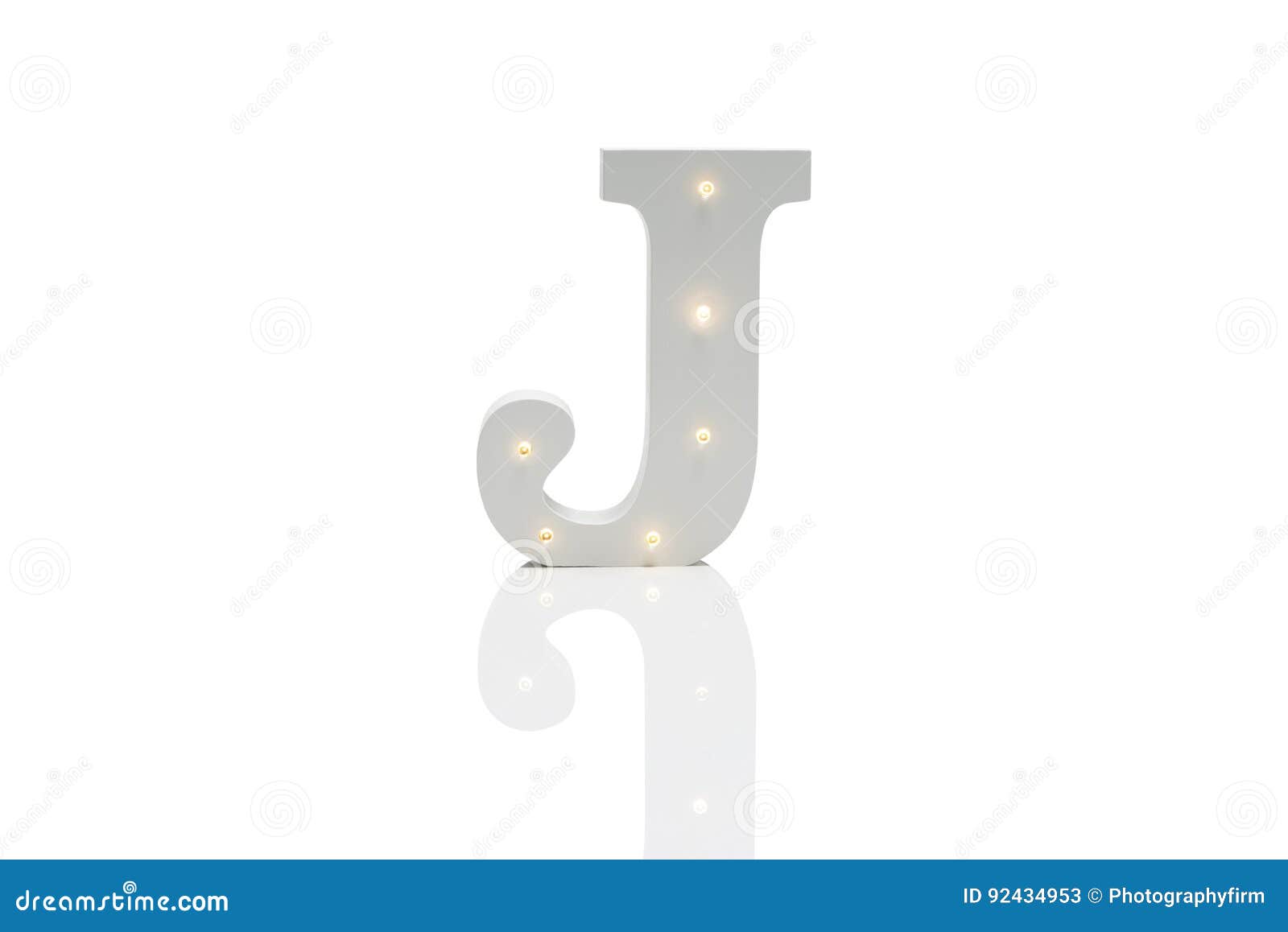 Decorative Letter J with Embedded LED Lights Over White Background