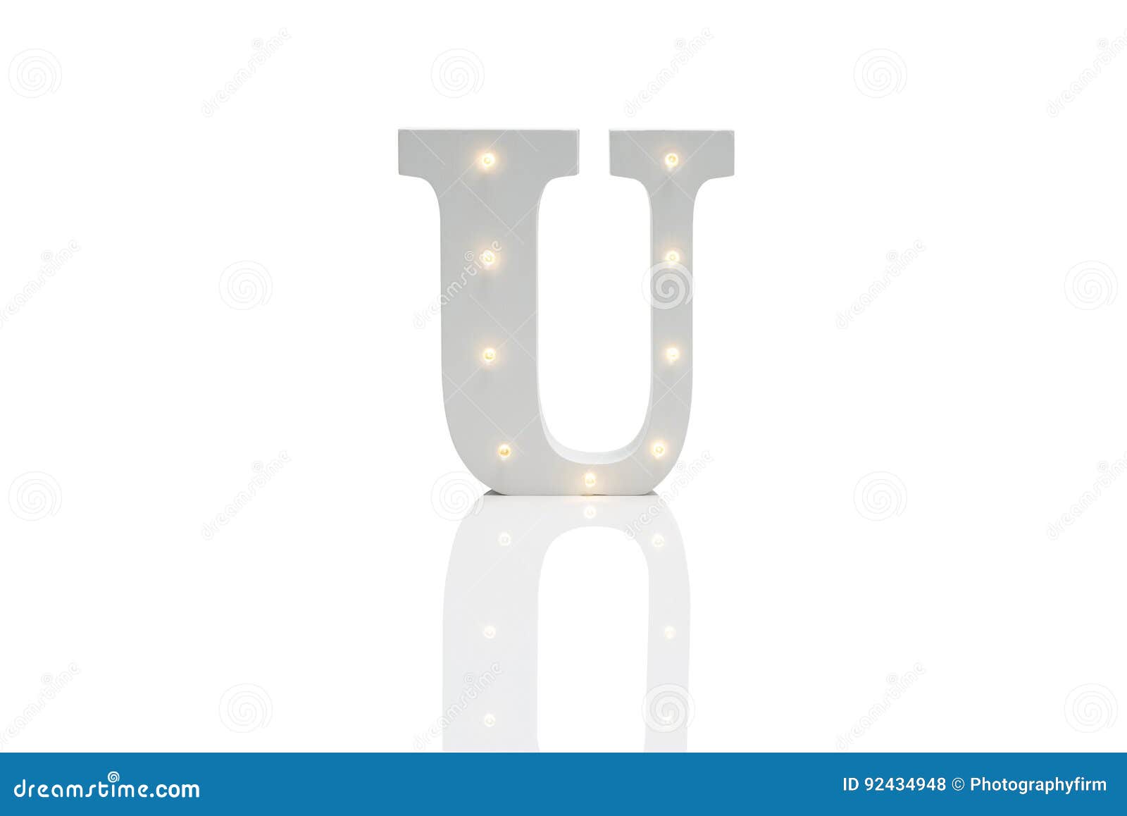 Decorative Letter U with Embedded LED Lights Over White Background
