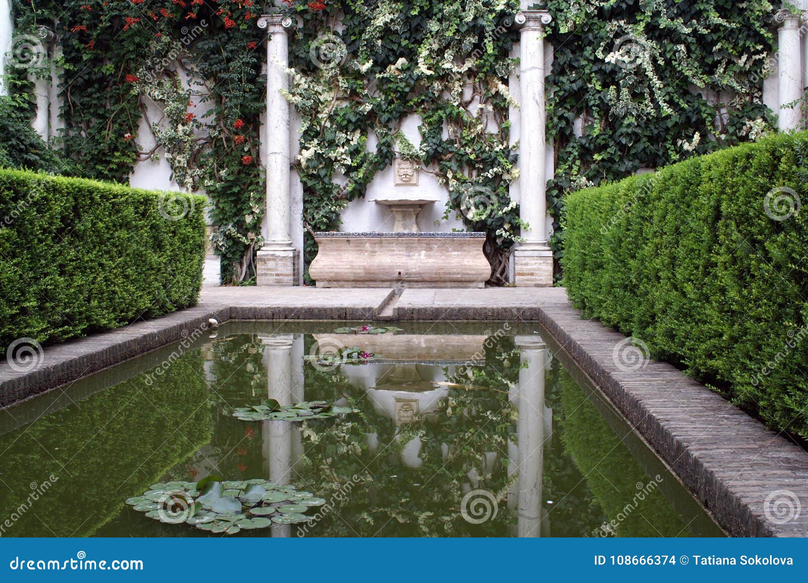 Decorative Pond In The Spanish Castle In Seville Stock Photo