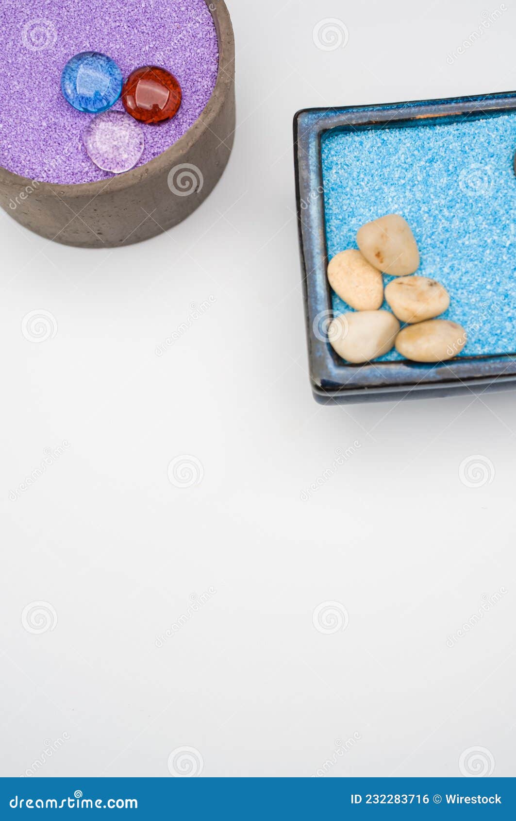 Decorative Vases with Colored Sand and Pebbles on a White Backgr Stock