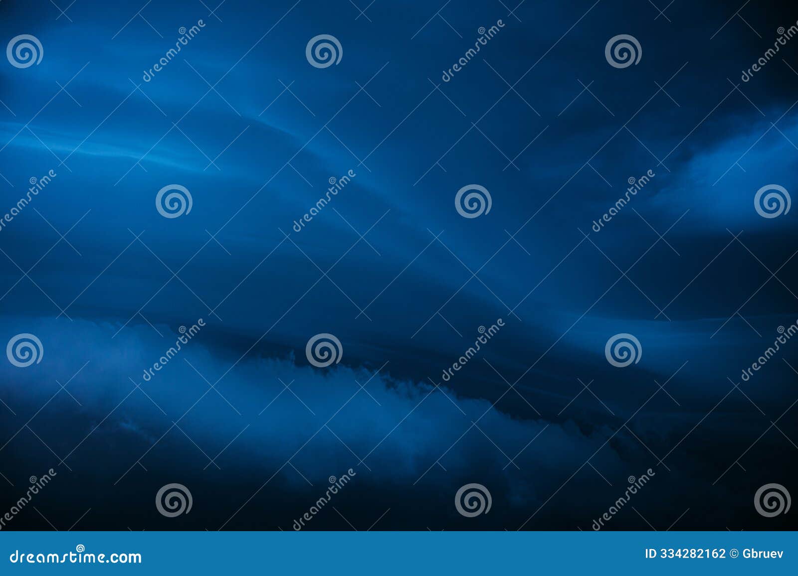 deep blue cloudy sky with dark storm clouds during rain. natural background with rainclouds. natural weather background