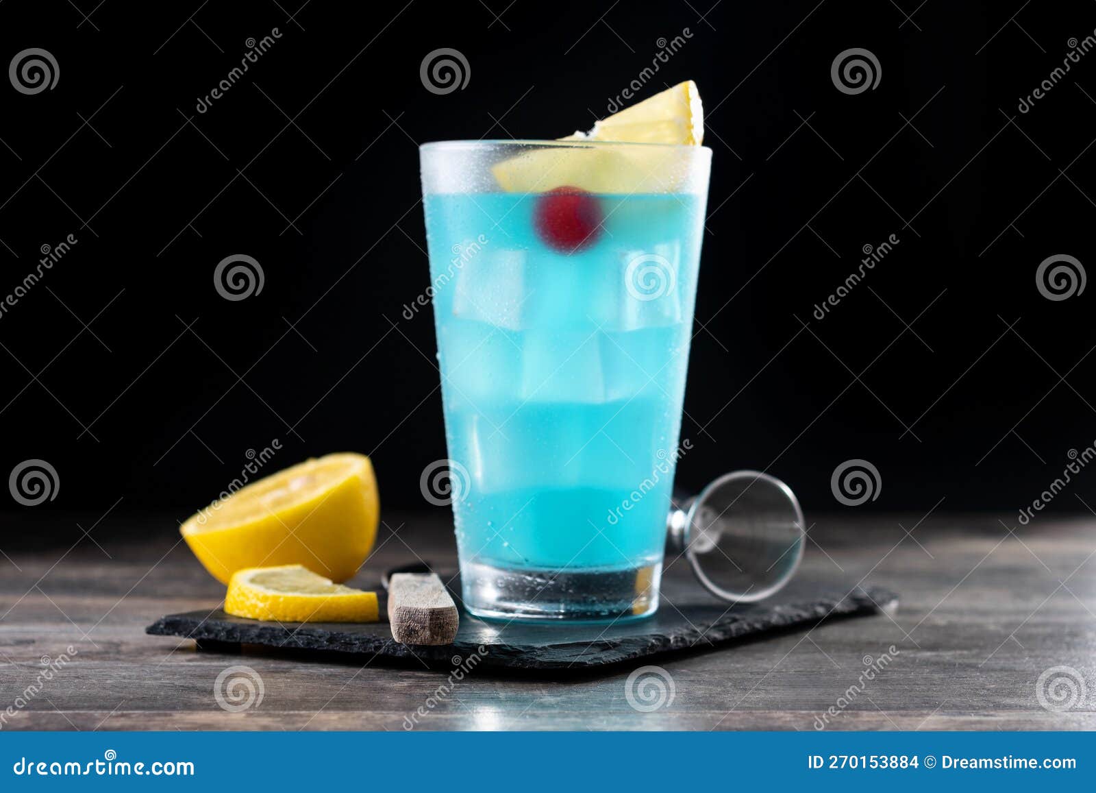 Deep Blue Sea Martini Cocktail on Wooden Table Stock Photo - Image of ...