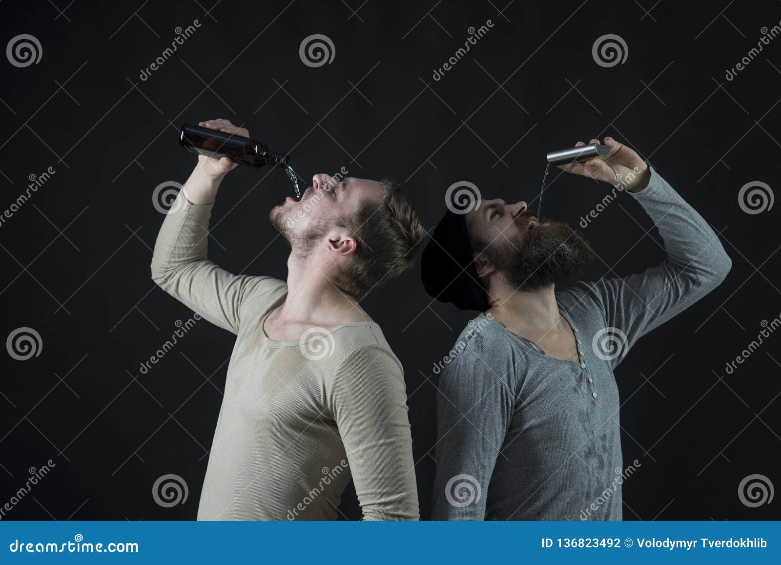 Deep Drinking. Alcoholics. Men Drinking Alcohol from Bottle and Flask ...