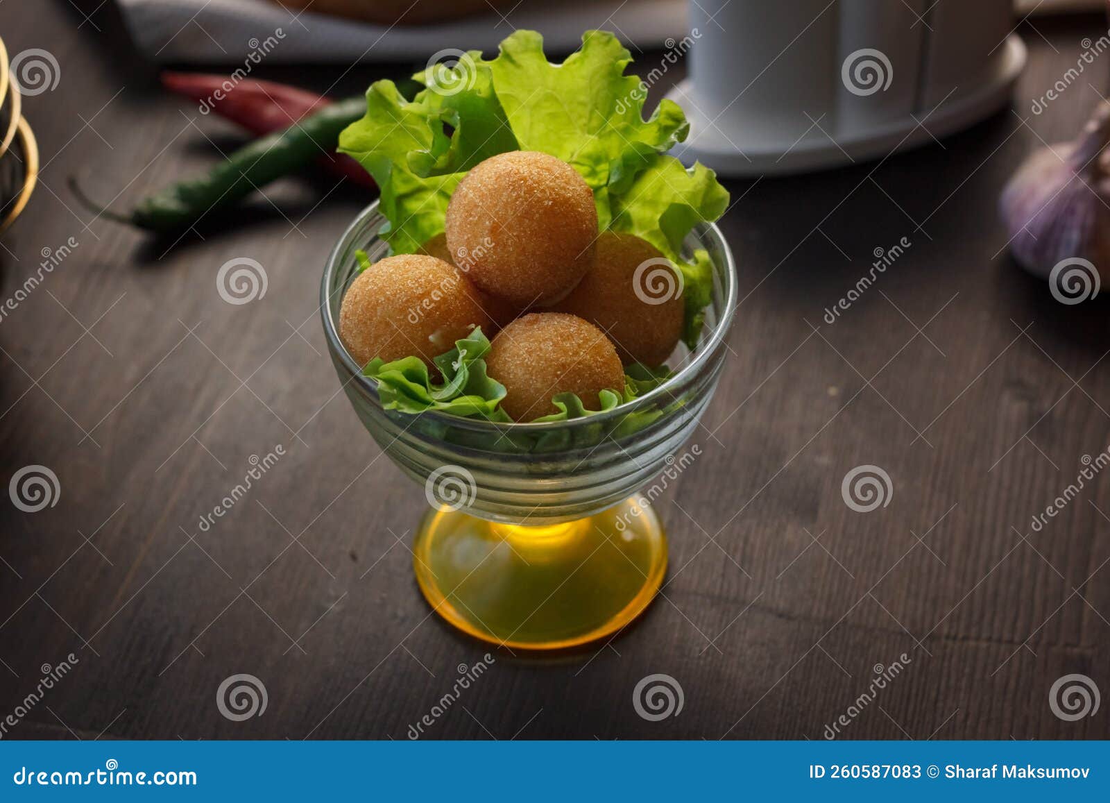 Deep Fried Cheese Balls, Homemade Apetizer with Lettuce Leaves Stock