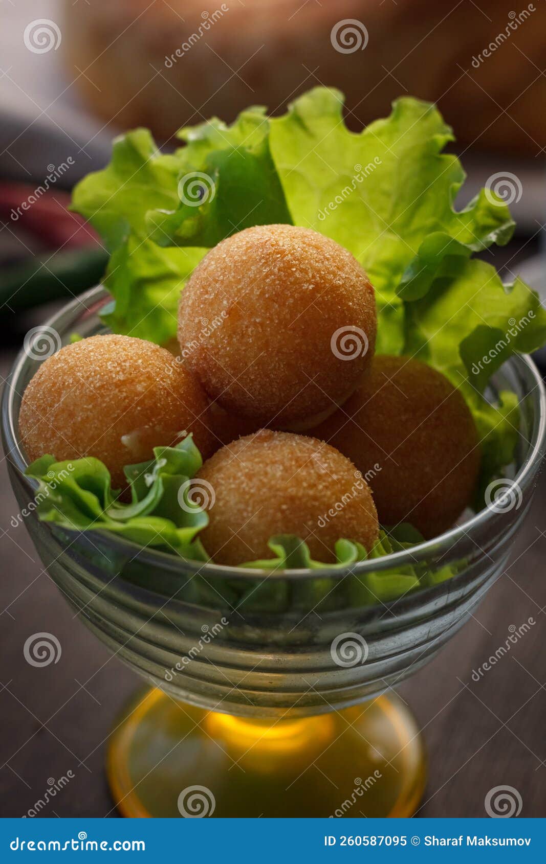 Deep Fried Cheese Balls, Homemade Apetizer with Lettuce Leaves Stock